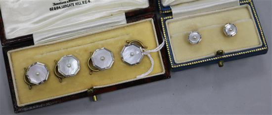 A pair of 18ct gold and mother of pearl cufflinks and similar studs (boxed).